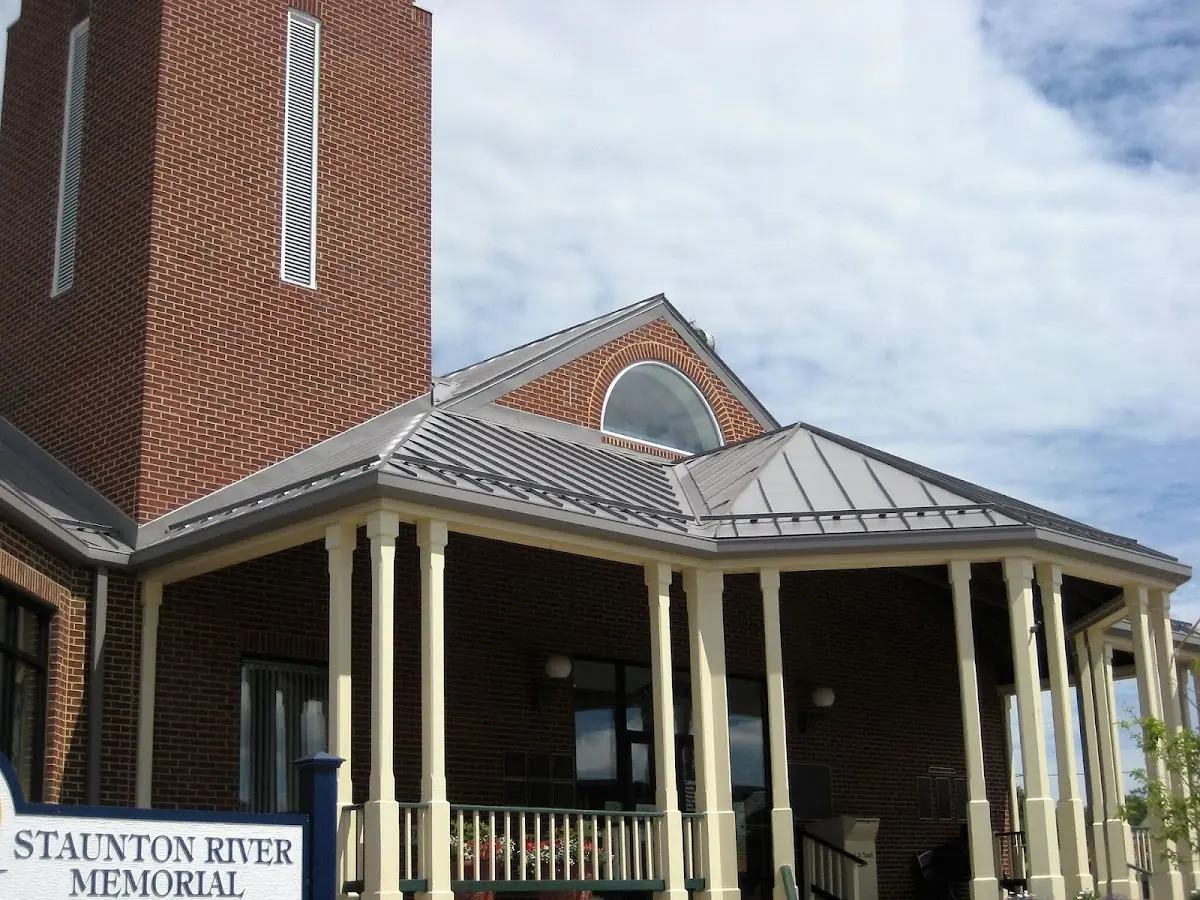 Skilled roofing craftsmen working on a residential roof in Thirteen Forks